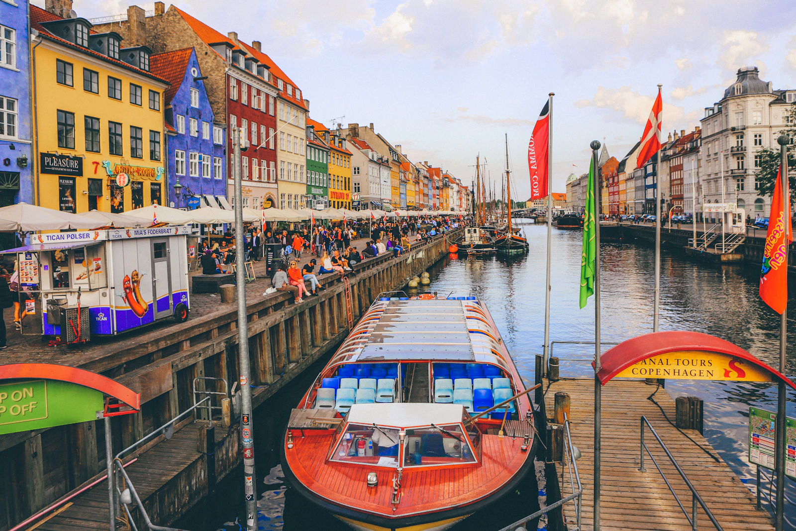 Nyhavn waterfront canal with colorful townhouses in Copenhagen