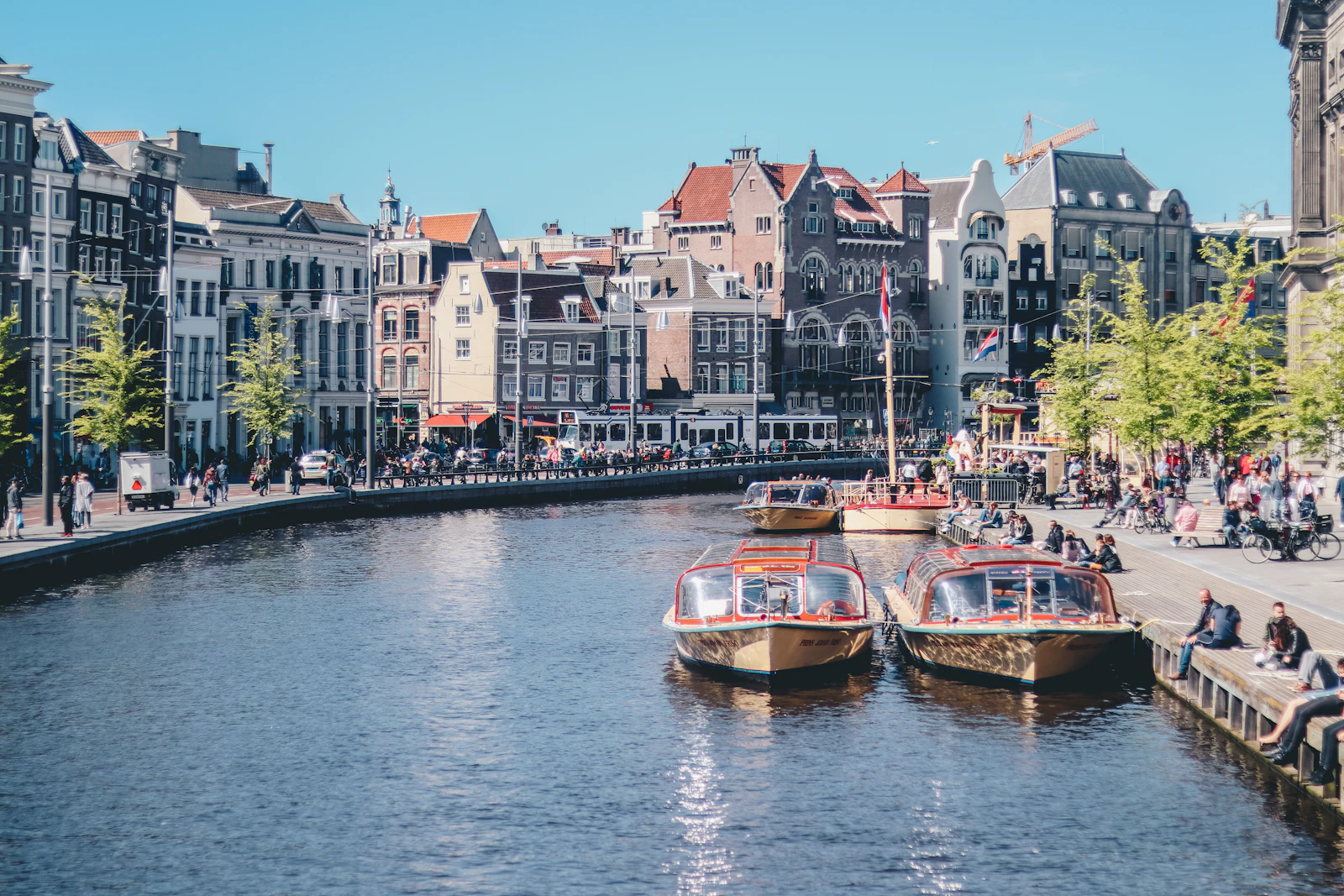 Boats on the IJ river in Amsterdam
