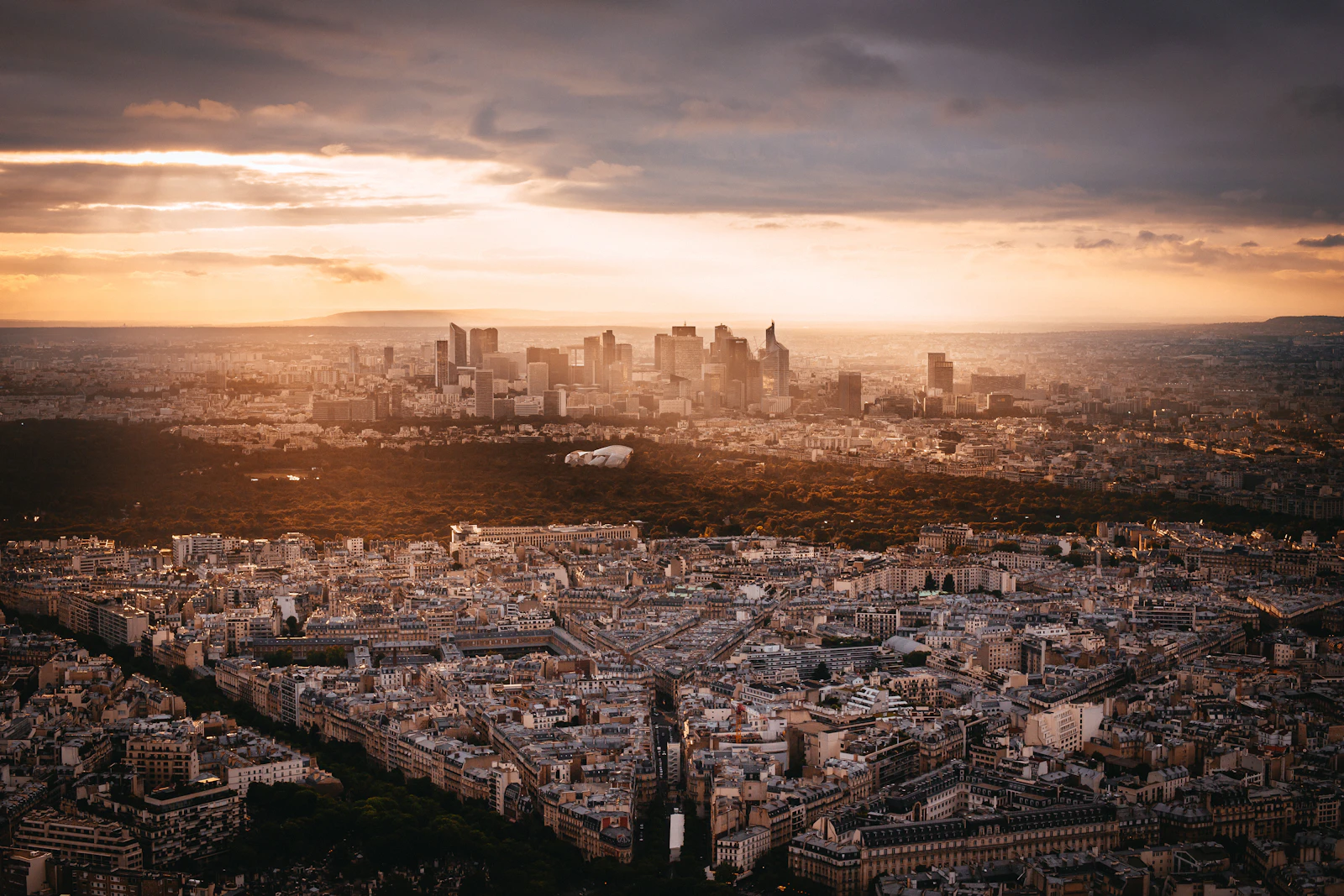 Aerial view of Paris rooftops at golden hour