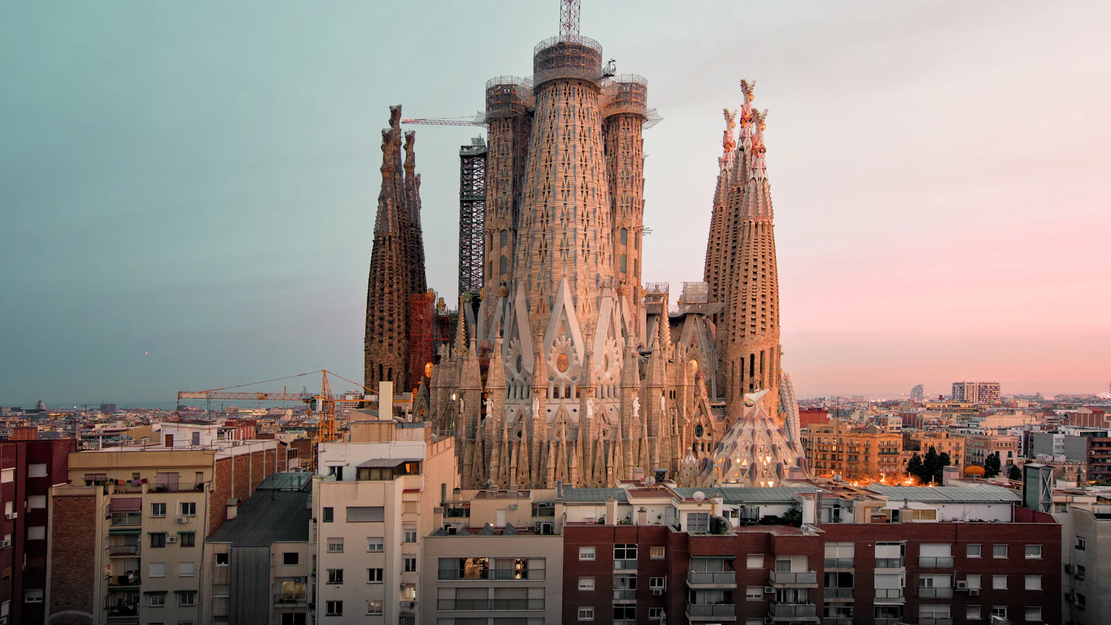 Sagrada Familia basilica illuminated at golden hour in Barcelona