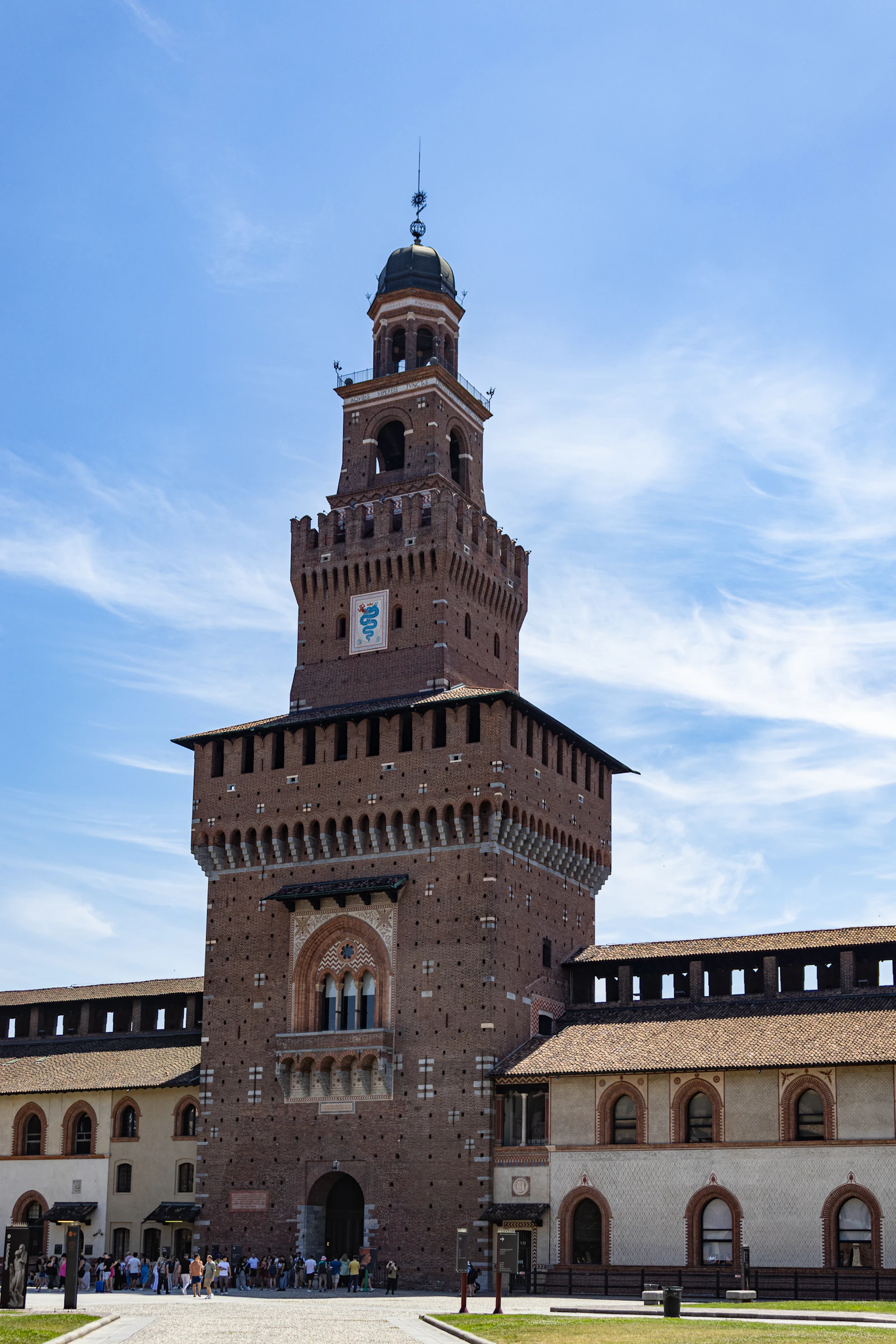Castello Sforzesco with clock tower in Milan