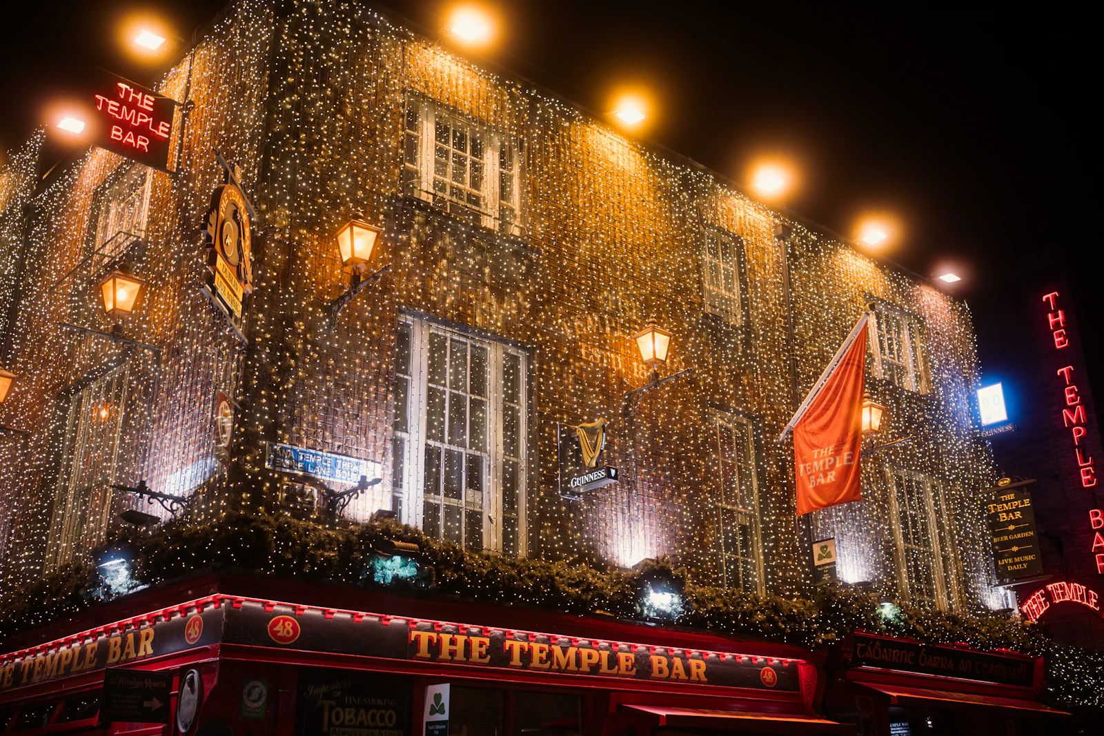 The Temple Bar pub in Dublin lit at night